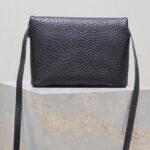 Saint Laurent Cassandre Envelope Messenger In Lambskin Black